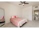 Cozy bedroom features a ceiling fan and plush carpet, creating a relaxing atmosphere at 8502 E Santa Catalina Dr, Scottsdale, AZ 85255