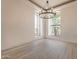 A bright dining room with light wood floors, ample natural light, and neutral decor at 8502 E Santa Catalina Dr, Scottsdale, AZ 85255