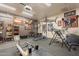 Spacious exercise room features a variety of gym equipment and unique decor, perfect for fitness enthusiasts at 8502 E Santa Catalina Dr, Scottsdale, AZ 85255