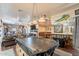 Spacious game room offers a pool table, wet bar, and comfortable seating area at 8502 E Santa Catalina Dr, Scottsdale, AZ 85255