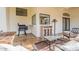 Inviting outdoor patio with grill, comfortable seating, and decorative accents for relaxing and entertaining at 8502 E Santa Catalina Dr, Scottsdale, AZ 85255