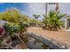 A serene backyard pond complements the lush desert landscaping, creating a peaceful escape at 8502 E Santa Catalina Dr, Scottsdale, AZ 85255