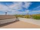 Rooftop deck provides stunning views of the neighborhood and mountains, offering a serene outdoor space at 8502 E Santa Catalina Dr, Scottsdale, AZ 85255