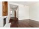 This living room showcases dark hardwood floors and bright white walls at 902 W Glendale Ave # 102, Phoenix, AZ 85021