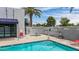 Fenced backyard features an in-ground pool, jacuzzi, and patio with lush landscaping at 902 W Glendale Ave # 102, Phoenix, AZ 85021