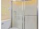 Clean and well-maintained bathroom includes a sliding glass shower door and a modern toilet at 922 S 80Th St, Mesa, AZ 85208