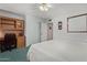 Bedroom with desk nook, closet and green carpet at 922 S 80Th St, Mesa, AZ 85208