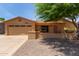 Charming single-story home with a two-car garage, desert landscaping, and inviting curb appeal at 922 S 80Th St, Mesa, AZ 85208