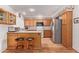 Kitchen features a breakfast bar with stools, and stainless steel appliances at 922 S 80Th St, Mesa, AZ 85208