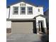 Charming two-story home featuring a two-car garage and stone accents at 9819 S 11Th St, Phoenix, AZ 85042