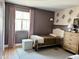 Bedroom featuring ample natural light, wall decor, and comfortable furnishings at 984 W Belmont Red Trl, San Tan Valley, AZ 85143