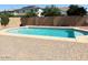 Sparkling private pool with a paved patio, perfect for outdoor relaxation and entertaining at 984 W Belmont Red Trl, San Tan Valley, AZ 85143