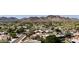 Scenic aerial view featuring homes nestled in a vibrant neighborhood with picturesque mountain views at 10434 N 44Th N St, Phoenix, AZ 85028