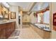 Luxurious bathroom with a soaking tub, mosaic ceiling, granite counters, and a walk-in shower at 10434 N 44Th N St, Phoenix, AZ 85028