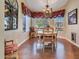 Charming dining room with decorative window treatments and a cozy table and chairs at 10434 N 44Th N St, Phoenix, AZ 85028