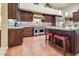 Gourmet kitchen with custom cabinetry, granite countertops, and professional-grade stainless steel appliances at 10434 N 44Th N St, Phoenix, AZ 85028