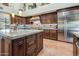 Well-equipped kitchen boasting granite countertops, custom cabinets, and stainless steel appliances at 10434 N 44Th N St, Phoenix, AZ 85028