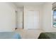 This light-filled bedroom provides lots of closet space and exterior views at 11872 W Duane Ln, Peoria, AZ 85383
