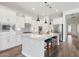 Contemporary kitchen with stainless appliances, a spacious island, and ample cabinet space at 11872 W Duane Ln, Peoria, AZ 85383