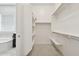 The walk-in closet features an organization system with plenty of shelving and hanging space at 11872 W Duane Ln, Peoria, AZ 85383