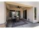 Covered patio with a ceiling fan and a dining table set at 14124 W Bent Tree S Cir, Litchfield Park, AZ 85340