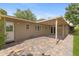 A large backyard with paver patio, a pergola, and access to the house at 143 E Winter Dr, Phoenix, AZ 85020