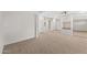 Bedroom with built-in closet, carpeted floors, neutral paint, and adjoining bathroom at 143 E Winter Dr, Phoenix, AZ 85020