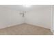 Neutral bedroom with carpeted floors, white walls, and natural light at 143 E Winter Dr, Phoenix, AZ 85020