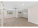 Neutral bedroom with carpeted floors, ceiling fan, natural light, and a closet at 143 E Winter Dr, Phoenix, AZ 85020