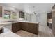 Bright kitchen featuring stylish cabinetry, countertops, pendant lighting, and stainless steel appliances at 143 E Winter Dr, Phoenix, AZ 85020