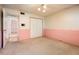 This bedroom has a double closet and doorway entrance from a hallway at 1562 W Las Palmaritas Dr, Phoenix, AZ 85021