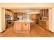 Spacious kitchen with a large island, granite countertops, and stainless steel appliances at 1562 W Las Palmaritas Dr, Phoenix, AZ 85021