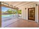Covered patio featuring natural lighting and view of backyard pool, great for outdoor entertaining or relaxation at 1562 W Las Palmaritas Dr, Phoenix, AZ 85021
