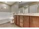 Bathroom featuring double sink vanity, soaking tub, and neutral wall color at 16525 E Avenue Of The Fountain -- # 113, Fountain Hills, AZ 85268