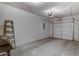 A clean two car garage with a door and space for storage or projects at 16525 E Avenue Of The Fountain -- # 113, Fountain Hills, AZ 85268