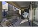 Enjoy this charming, covered outdoor patio with comfortable seating area and peaceful views at 16525 E Avenue Of The Fountain -- # 113, Fountain Hills, AZ 85268