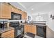 Functional kitchen with appliances, providing an efficient cooking space at 16887 W Belleview St, Goodyear, AZ 85338