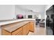 Functional kitchen with granite countertops and an open layout at 16887 W Belleview St, Goodyear, AZ 85338