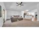 Spacious living room with modern furnishings and an open floor plan, perfect for entertaining at 16887 W Belleview St, Goodyear, AZ 85338