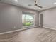 Bedroom with hardwood floors, ceiling fan and gorgeous outdoor view from the window at 1701 E Camino Del Santo --, Phoenix, AZ 85022