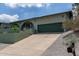 Street view of a desert landscaped home with an attached garage at 1701 E Camino Del Santo --, Phoenix, AZ 85022
