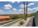 Scenic view of the street, property landscaping, and mountain views at 1701 E Camino Del Santo --, Phoenix, AZ 85022