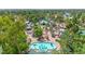 Attractive aerial view of a charming amusement park featuring unique architecture, rides, and landscaped grounds at 1814 W Thomas Rd, Phoenix, AZ 85015