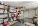 Organized garage with shelving units and ample storage space at 1814 W Thomas Rd, Phoenix, AZ 85015