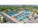 Aerial view of recreation area, including tennis courts, basketball courts, and a swimming pool at 1814 W Thomas Rd, Phoenix, AZ 85015
