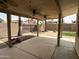 View of covered back patio area with a gravel backyard, great for outdoor entertaining and relaxing at 18899 N 77Th Ave, Glendale, AZ 85308