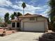 Charming single-story home featuring a well-manicured front yard and attached two-car garage at 18899 N 77Th Ave, Glendale, AZ 85308