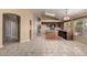 Kitchen has stainless sink, stone counters and an island at 18899 N 77Th Ave, Glendale, AZ 85308