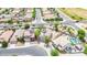 This aerial view showcases the neighborhood homes, desert landscaping, and proximity to local amenities at 2016 S 102Nd Ln, Tolleson, AZ 85353