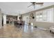 Combined dining and kitchen space featuring tile floors and plenty of natural light at 2016 S 102Nd Ln, Tolleson, AZ 85353